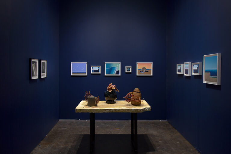 Photo of Ochi's booth at NADA Miami 2021, featuring works by Matthew F Fisher and Sam Shoemaker