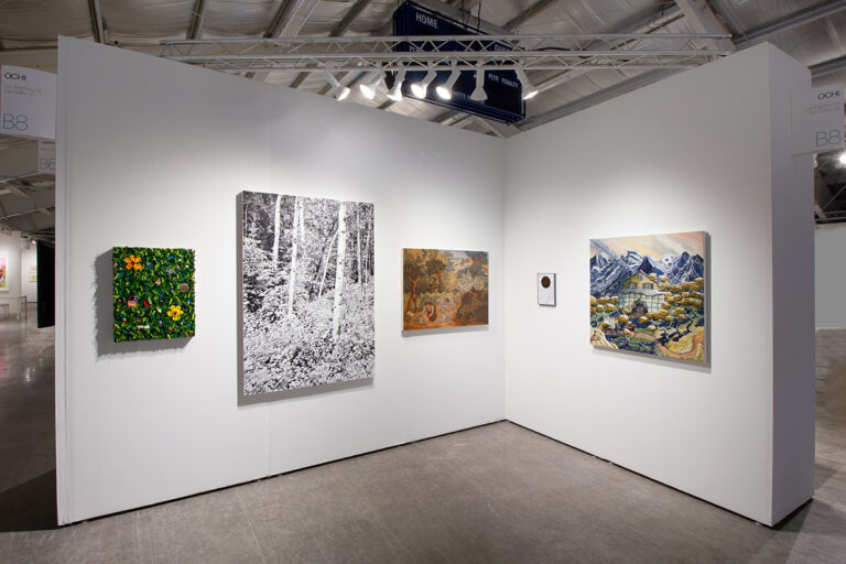Ochi's booth at Intersect Aspen featuring paintings